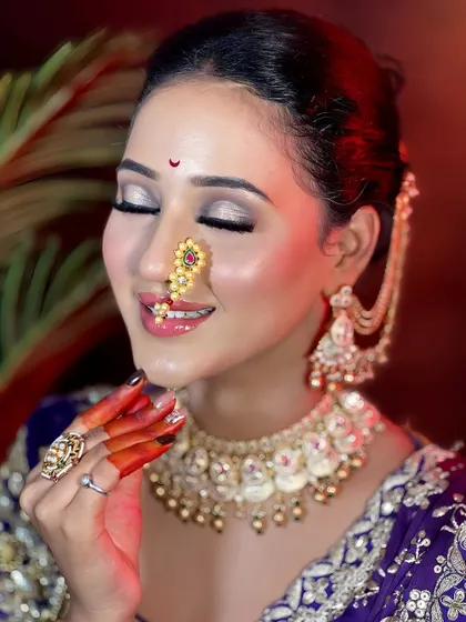 This shot captures the shimmering eyeshadow and flawless base. I use high-quality products to ensure the makeup looks great in professional photos.
