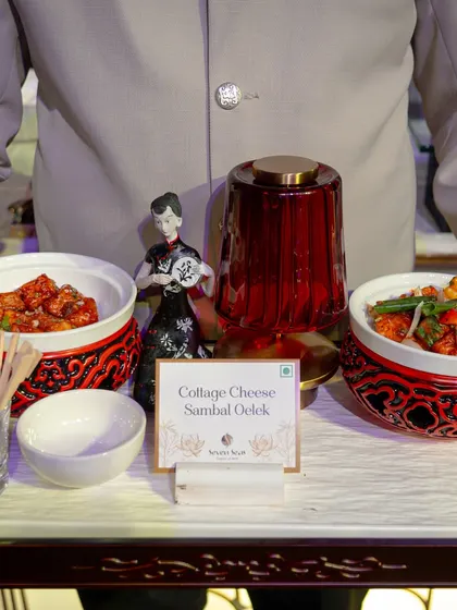 Our Cottage Cheese Sambal Oelek, presented on a themed tray. This dish offers a spicy and flavourful vegetarian option, showcasing our ability to cater to diverse palates with our Pan-Asian menu.