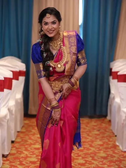 Another shot of our beautiful South Indian bride, looking graceful and elegant. Her makeup is designed to photograph beautifully.