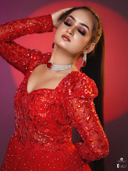 A close-up showing the beautifully blended red and black smokey eye.