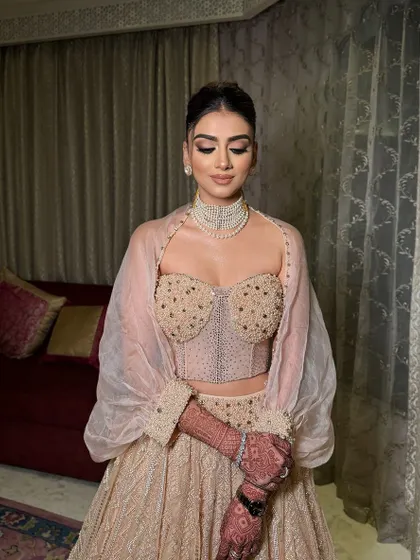 A serene moment. The soft lighting highlights the beautiful contour and highlight on her skin.