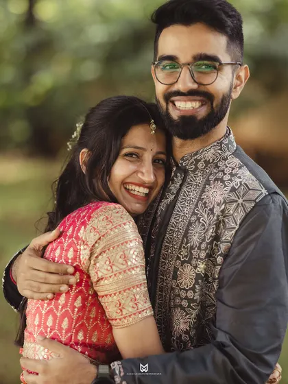 A joyful, close up portrait of the couple. Their bright smiles are infectious and perfectly capture the happiness of their Roka day.
