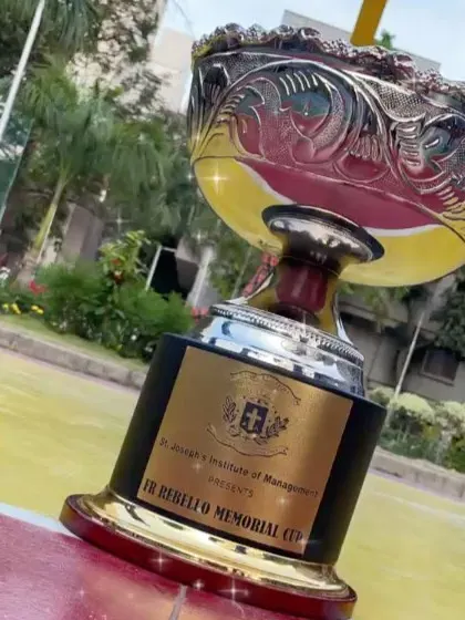 A close-up of the FR Rebello Memorial Cup trophy.