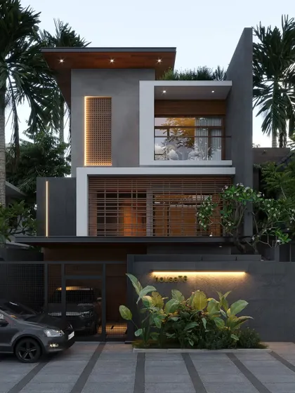 A compact, multi-level home in Bangalore with a dark grey facade, wood screens, and integrated lighting for a moody, sophisticated look.