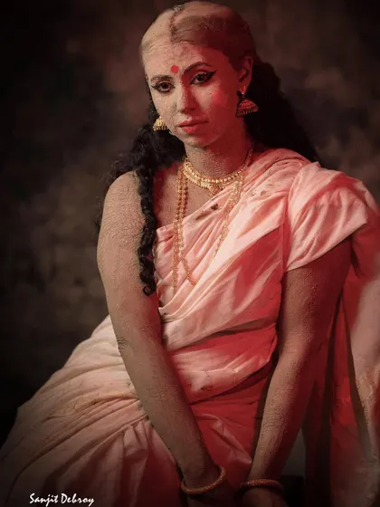 A portrait from the 'Navami' phase of the story. The use of mud from the homes of prostitutes in Sonagachi to create the idol is a powerful statement of inclusivity I wanted to explore.
