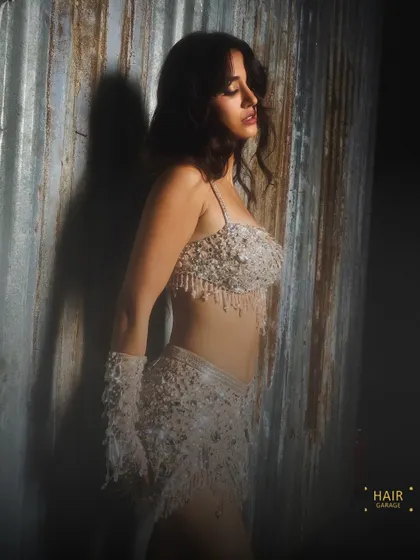 A radiant makeup look for Disha Patani's IPL performance. The look had to be glamorous and camera-ready, with a focus on glowing skin and defined eyes that would pop on stage.