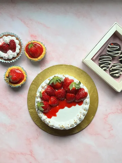Strawberry season is my favourite! Here's a spread of some of my strawberry desserts, including a fresh cream cake, mini cheesecakes, tarts, and chocolate-dipped strawberries.