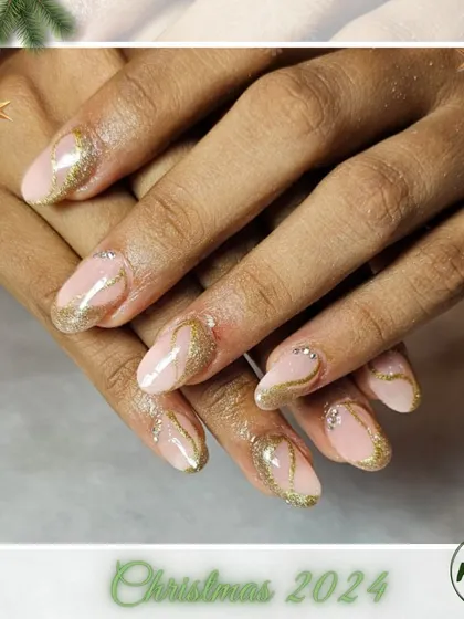 A beautiful gold and nude design perfect for the holidays. The swirling gold glitter gives the impression of festive ribbons.