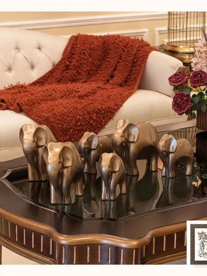 This herd of elephant sculptures symbolizes unity and grace. Placed on a coffee table, these exquisite decor pieces elevate your home with a sense of family and strength.
