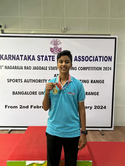 Onkar with his gold medal from the Air Rifle Men's team event.