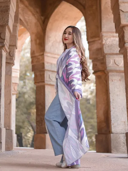 A slightly different angle that plays with the depth of field, keeping the model sharp while the background arches recede softly.