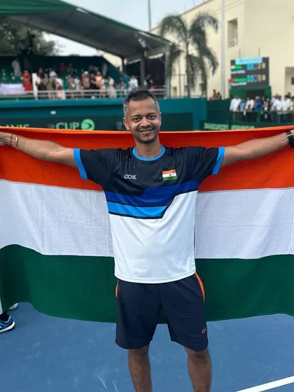 Holding the tricolor on my birthday after a successful Davis Cup tie. There's no better gift than contributing to the team's success and feeling the support from everyone.