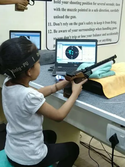 It was great to see shooters of all ages participate, like this young competitor using the electronic scoring system during the championship.