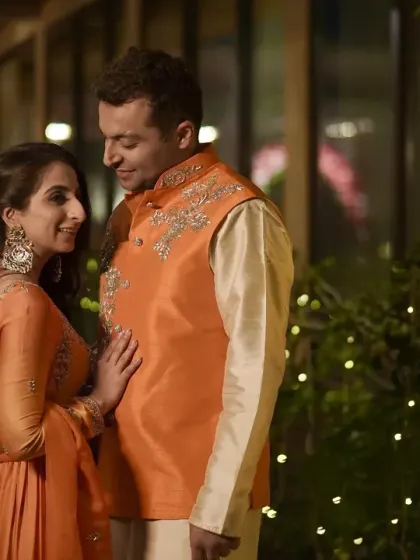 A beautiful portrait of the couple, with the groom looking lovingly at his bride.