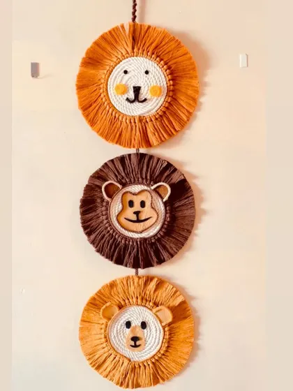 Another view of the three-in-one animal wall hanging. This is a great space-saving piece that brings a lot of character to a nursery wall.