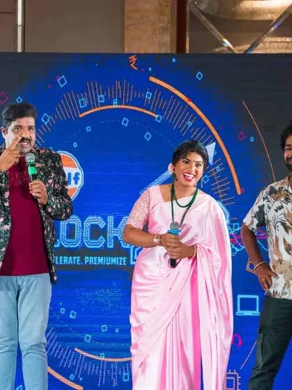 A candid moment on stage during the Indian Oil corporate show. Team performances always have a special energy.