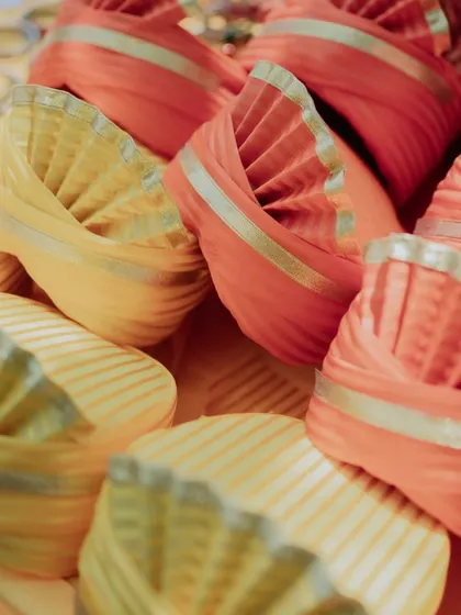 A close-up of the colorful turbans offered as favors to guests.