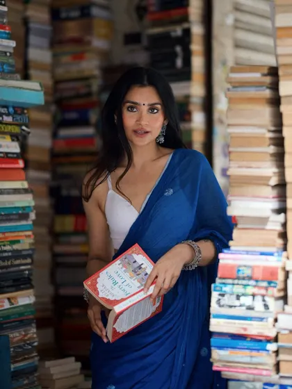 A direct-to-camera look from my Kolkata bookstore shoot, creating a personal connection with the viewer.