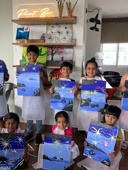 A group of proud little artists showing off their firework paintings from a workshop at our studio. The results were explosive.