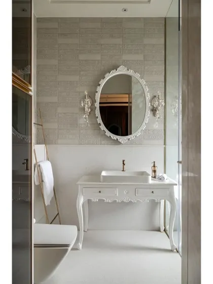 The all-white master bathroom in the "Cityscape Serenity" home is pure elegance. It features a classic carved vanity, an ornate mirror, and crystal wall sconces, creating a serene, spa-like atmosphere.