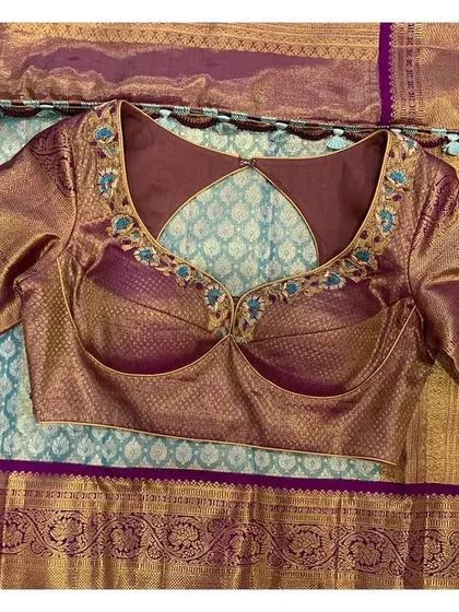 The front view of the violet padded blouse, showing the beautiful fit and detailed embroidery.