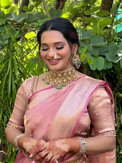 A close up of her engagement look. The skin is luminous, and the eyes are softly defined to let her natural beauty and happiness shine.