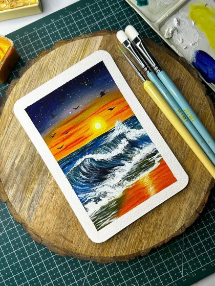 A beautiful sunset at a beach, captured in a polaroid-style gouache painting.