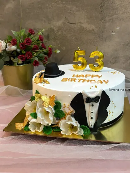 A slightly different take on my gentleman's cake, this one is a larger rectangular cake, perfect for a bigger celebration.