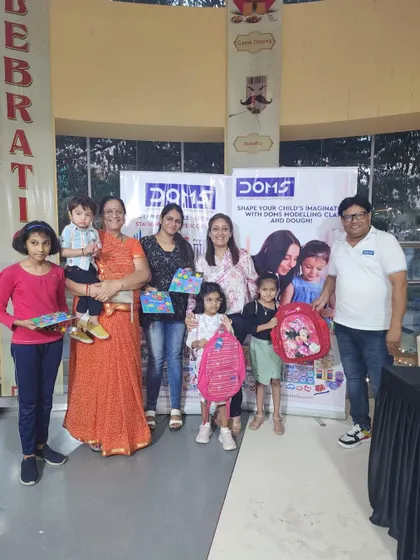 A group photo with some of our youngest participants and their families. Their enthusiasm is infectious and makes every event a joy.