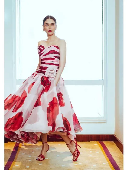 Another version of the Gauri & Nainika gown, this one with a flower detail at the waist. It’s all about those small tweaks that make a look unique.