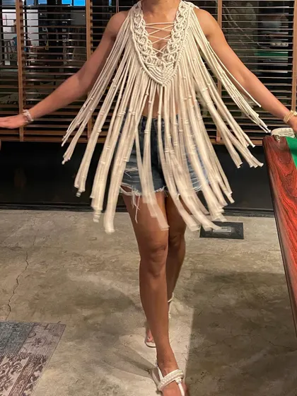 Twirling in my macrame cape. The long fringe has such wonderful movement, making it a fun and playful piece to wear. It’s perfect for dancing at a festival or walking along the beach.