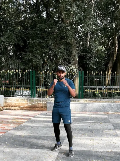 Ready for whatever comes next. Whether in the gym or outdoors, the fighter's stance is a reminder to always be prepared, stay grounded, and project positive energy.