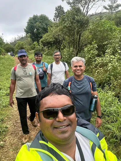 A selfie with a group of happy trekkers on the Thadiyandamol trek in Coorg. It's the highest peak in the district and offers stunning views.