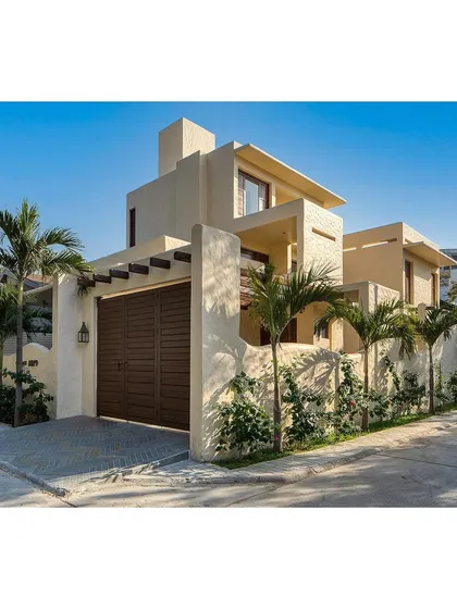 The exterior of Casa Aum in Ahmedabad evokes the richness of vernacular architecture. The hand-plastered walls and clean, geometric forms create a modern home that is deeply rooted in tradition.