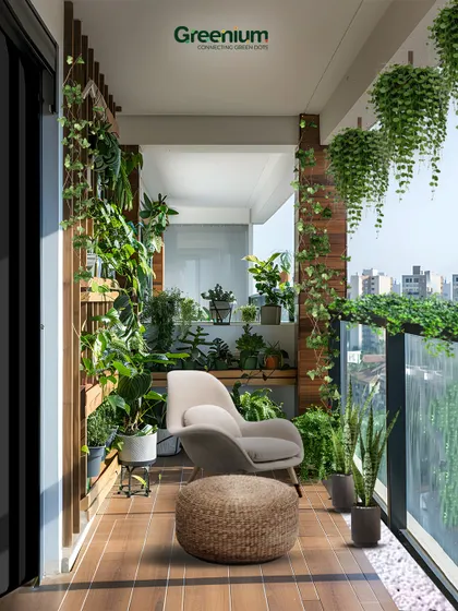 This is what a luxurious green balcony retreat looks like. With a comfortable chair, wooden flooring, and an abundance of plants including hanging vines and a vertical garden, this space is a perfect blend of comfort, style, and nature.