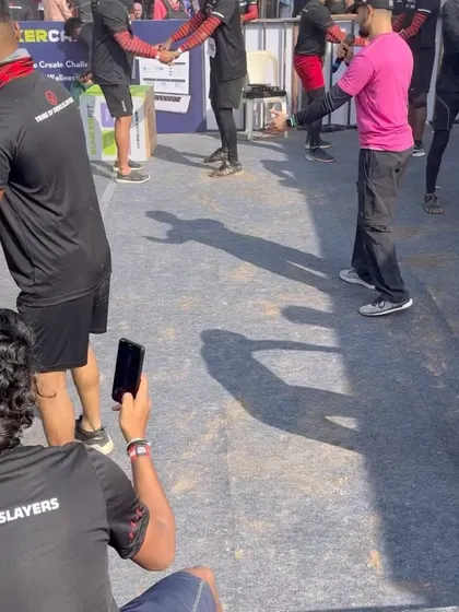 A behind-the-scenes look at the partner squat challenge. These events test your muscular endurance and your ability to work together under pressure.