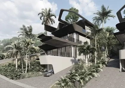 The Dona Paula Masterplan is composed of twisting, shifting roofs that fly out of the sloping terrain. This view shows how the modular house typologies are adapted to the contours, creating unique roofscapes across the development.