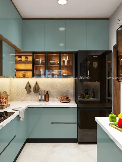 Another angle of the pastel blue kitchen, showcasing the smart storage solutions and integrated appliances. The glass-fronted cabinets add a decorative touch.