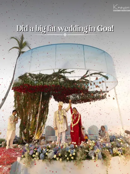 A spectacular wedding ceremony in Goa. The unique circular mandap, adorned with red flowers and surrounded by water, created a stunning focal point for this beachside celebration.