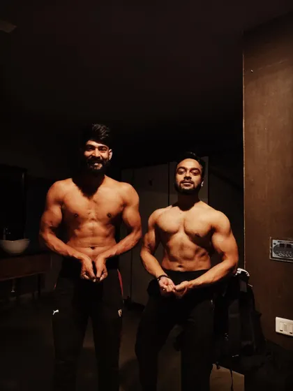 "Brother's after workout posing." A classic post-workout shot with my training partner.