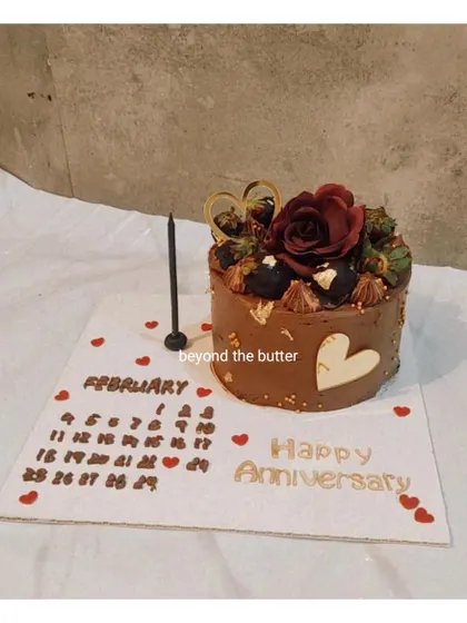 An anniversary cake with a chocolate calendar marking the special day in February.