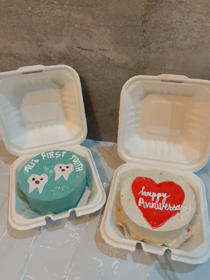 A bento cake for a baby's first tooth is such a fun idea. I also made a matching anniversary bento cake for the happy parents.