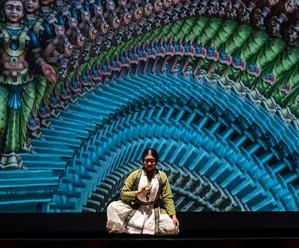 A meditative moment from 'Antariksha Sanchar', where the dancer is framed by a psychedelic, fractal representation of temple architecture. This is an example of how I use multimedia to explore spiritual concepts in a contemporary visual language.