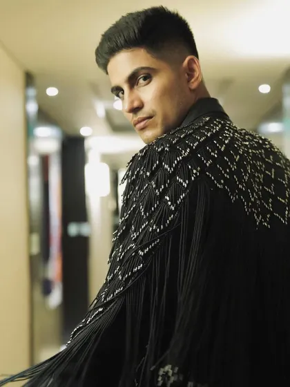A look from behind. The intricate, hand-beaded shoulder detailing on Shubman Gill's jacket is the focus here, showcasing the incredible craftsmanship I seek out for my clients.