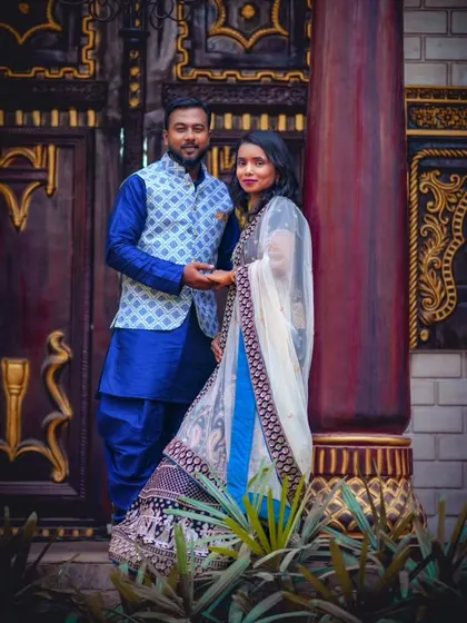 This couple opted for a coordinated blue and white ethnic look for their photoshoot. I provided both outfits, from his kurta and jacket to her detailed lehenga.
