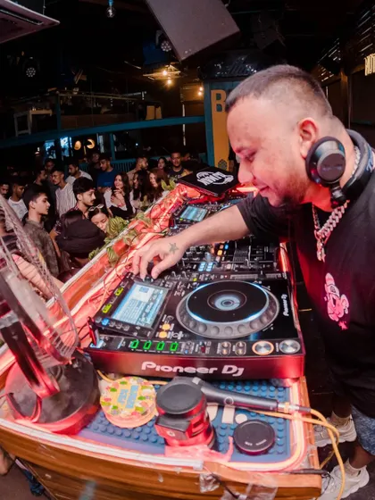 On the decks at Nuts & Brew in Guwahati. I bring my signature hip hop sound to clubs all across India.