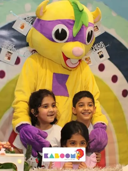 A birthday hug from Super K! Our mascot loves celebrating with the birthday child and their friends, creating unforgettable memories.