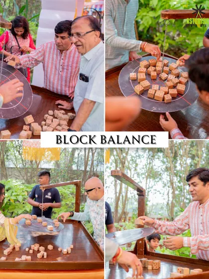 The "Block Balance" game in action. This steady-hand game was a huge hit, bringing out the concentration and competitive spirit of the guests.