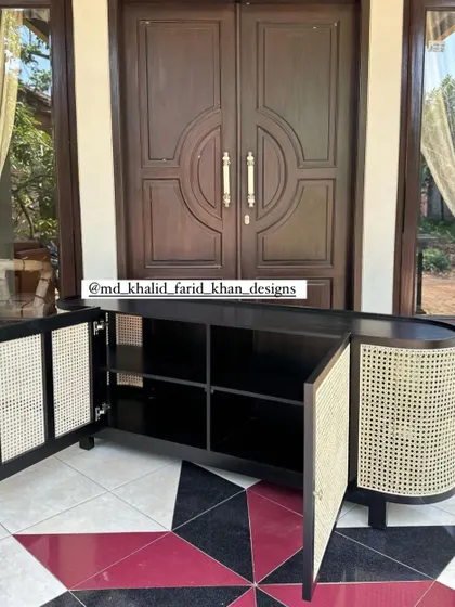 The sideboard with doors open from a different angle.