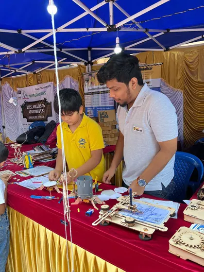 Absolutely splendid! These pictures capture the fun and discovery at one of our event stalls. Kids of all ages get to stop by, tinker with our kits, and get a taste of what it's like to be a maker.
